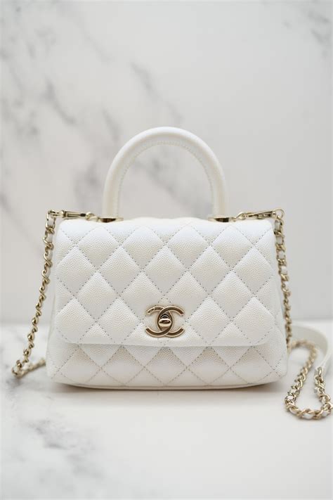 white iridescent chanel coco handle